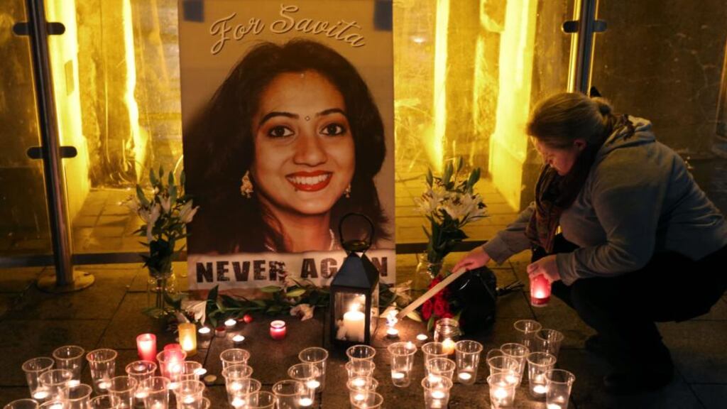 Candles are lit by the public at the vigil at Eyre Square in Galway city last evening to mark the first anniversary of the death of Savita Halappanavar. Photograph: Joe O’Shaughnessy.