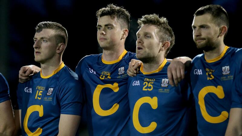 Cork players wearing their 1916 commemorative jerseys as they line up for the national anthem ahead of the Allianz Hurling League Division 1A game at Páirc U Rínn. Photograph:  Donall Farmer