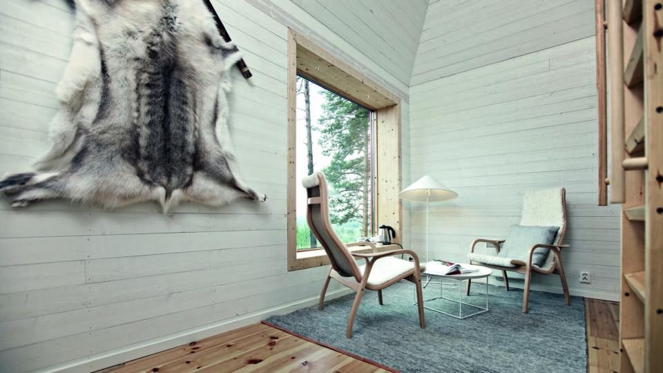 Blue Cone Tree Hotel  in Sweden, treehotel.se. Photograph: Taschen, from Tree Houses: Fairy Tale Castles in the Air