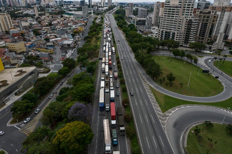 Supporters of Jair Bolsonaro use trucks to blockade a major highway in São Paulo. Photograph: Victor Moriyama/The New York Times