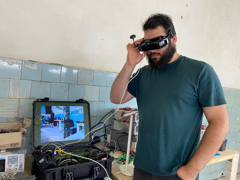 Ruslan Borovskiy with the ground station that commands Vitrolom’s flagship drone, Khmara. Photograph: Lara Marlowe