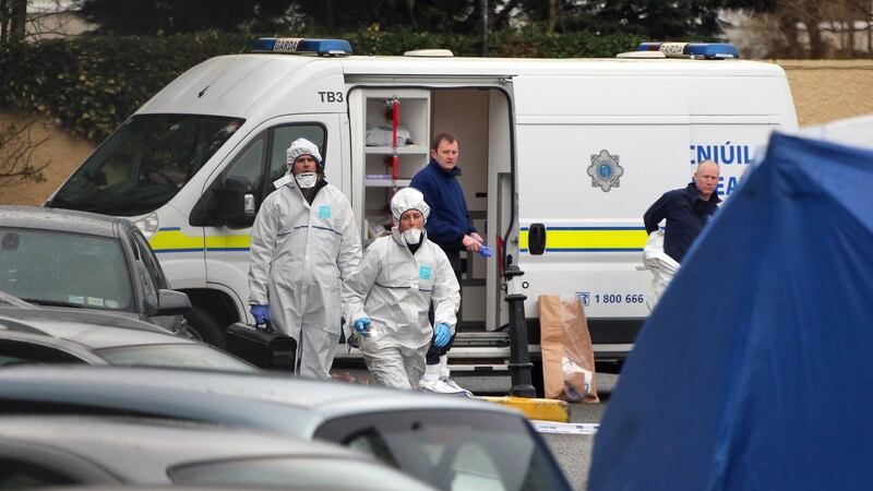 Gardaí outside Cumiskey’s pub on Blackhorse Avenue on December 31st, 2015, after Darren Kearns was shot dead the previous night in the car park. File photograph: Colin Keegan/Collins Dublin