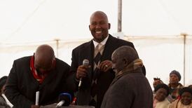 Mandela recovering well in hospital, says grandson