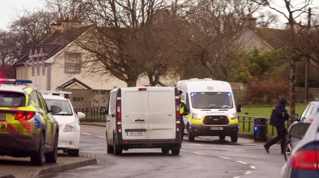 Gardaí carrying submachine guns and automatic pistols assisted unarmed colleagues at checkpoints in Rathkeale on Tuesday amid rising tensions in the area.
