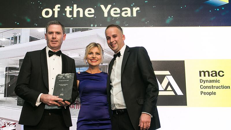 Damian Lynch, Managing Director, Etag Fixings presents the Fit Out Contractor of the Year award to David Caulfield and Tiffany Quinn