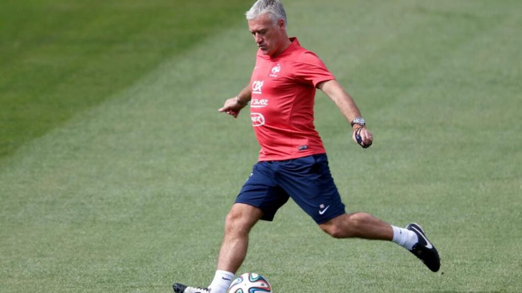 France’s head coach Didier Deschamps kicks a ball during a training session at the Botafogo soccer club’s Santa Cruz stadium. Photograph: Charles Platiau/Reuters