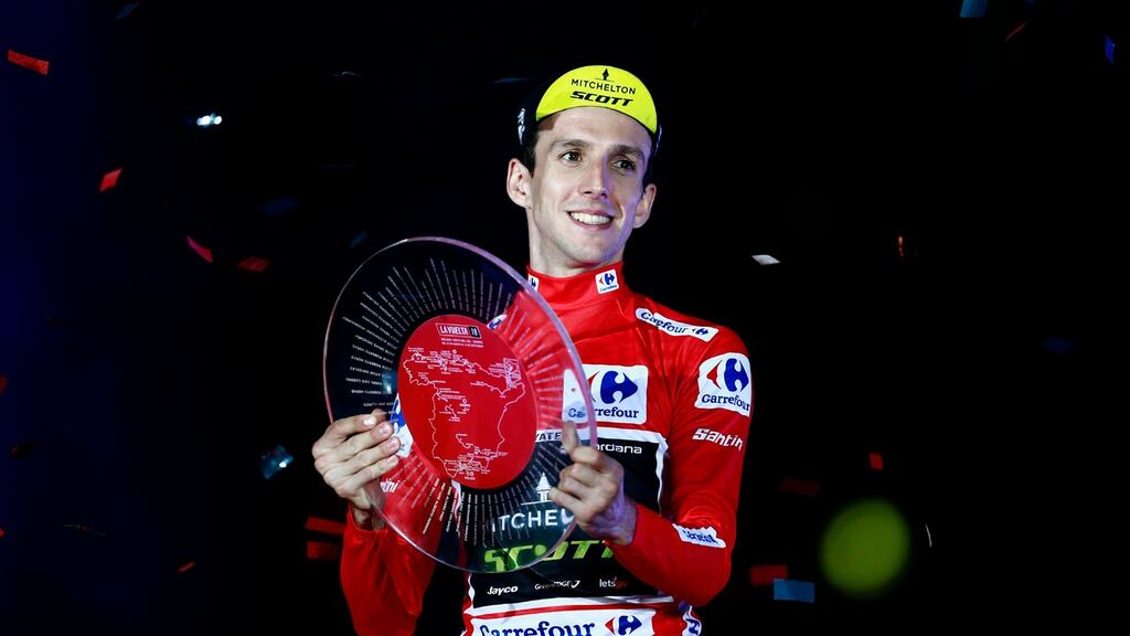 Britain’s Simon Yates celebrates on the podium after winning the 73rd edition of “La Vuelta” Tour of Spain in Madrid. Photograph: Getty Images