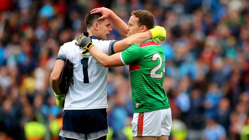 Dublin goalkeeper Stephen Cluxton with Andy Moran of Mayo after the game. Photograph: Ryan Byrne/inpho