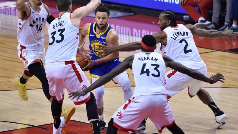 Steph Curry drives at the Toronto Raptors during Golden State Warriors Game 5 win. Photograph: Larry W Smith/EPA