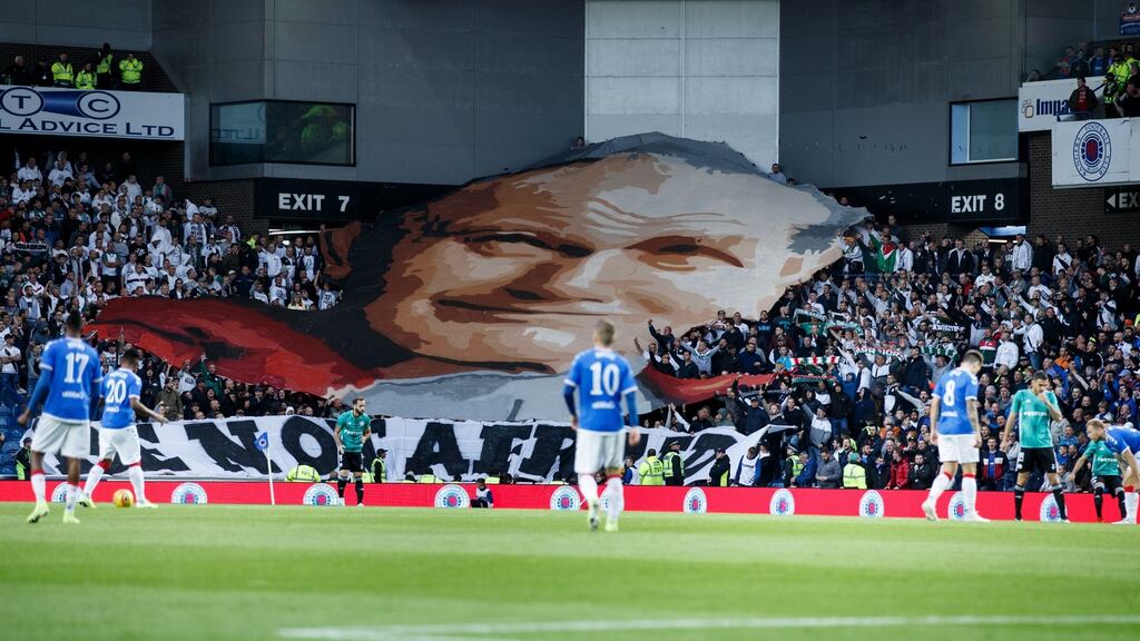 Legia Warsaw fans unveil a banner of Pope John Paul II during their Europa League qualifying clash with Rangers at Ibrox. Photo: Robert Perry/EPA