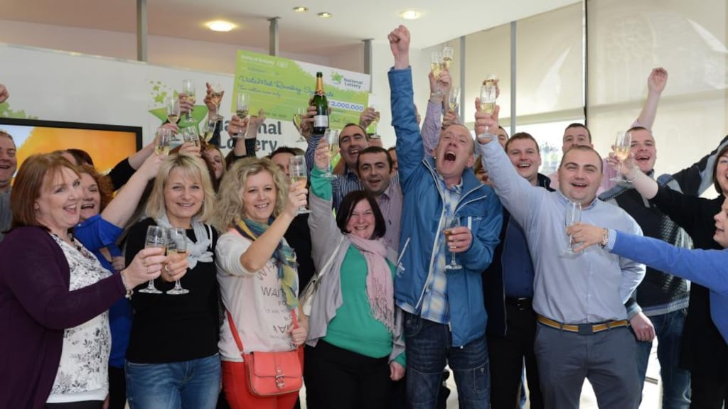 Members of the VistaMed syndicate from Rooskey, Co Leitrim, celebrating their lotto win. Photograph: Cyril Byrne/The Irish Times