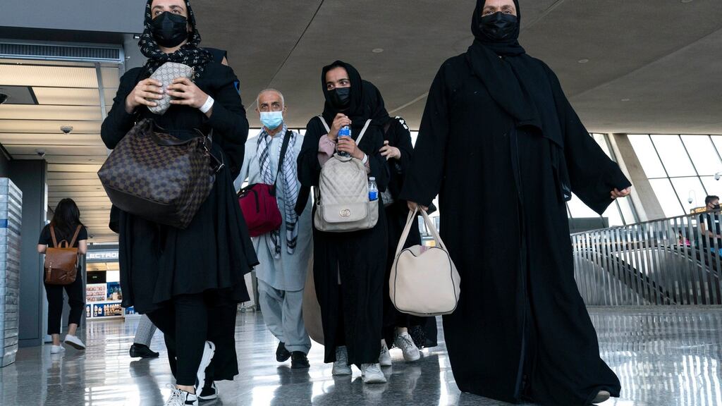 Families evacuated from Kabul, Afghanistan, arrive at Washington Dulles International Airport in Virginia on Wednesday. Photograph: Jose Luis Magana/AP