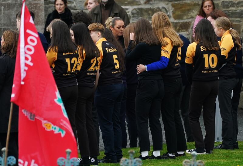 Members of Letterkenny Rugby Club gather at St Mary's Church in Ramelton, Co Donegal, for Leona Harper's funeral Mass. Photograph: Brian Lawless/PA