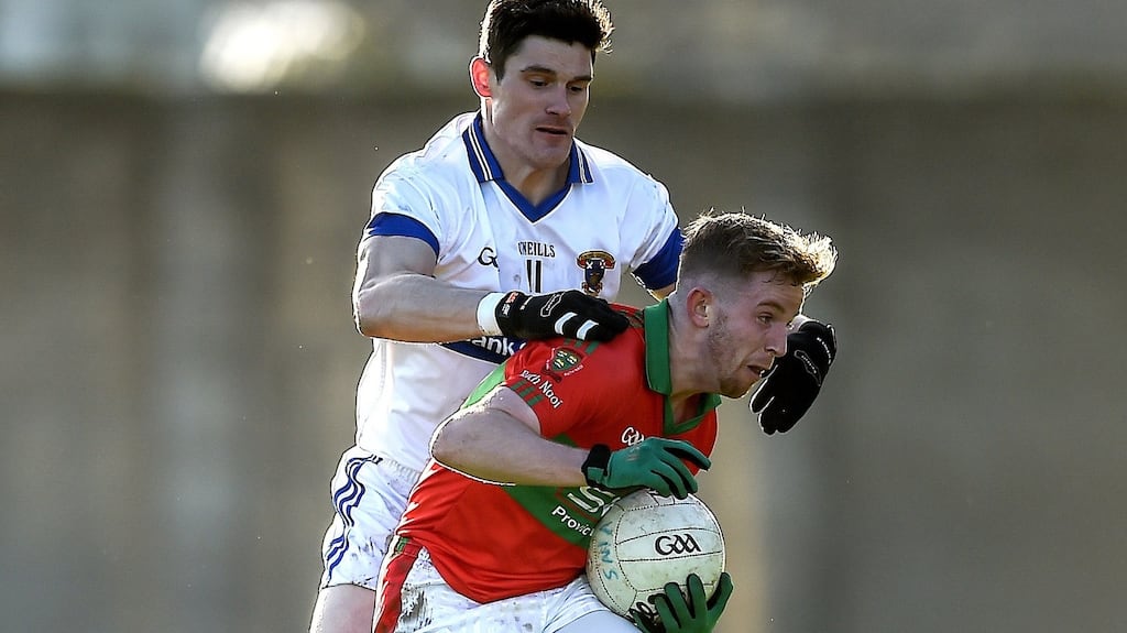 Rathnew’s Warren Kavanagh battles with Diarmuid Connolly of St Vincent’s during the Leinster club quarter-final in Aughrim, Co Wicklow. Photograph: Tommy Grealy/Inpho