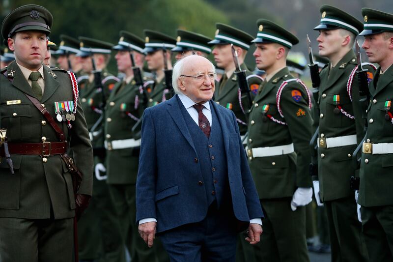 resident Michael D Higgins inspects the Guard of Honor before he departs for a 2018 state visit to Greece. Photograph: Maxwells