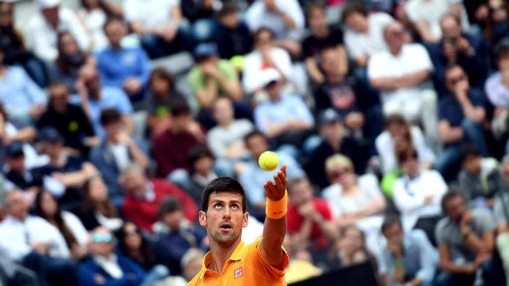 Novak Djokovic serves the ball during the Italian Open. Photo: Claudio Onorati/EPA