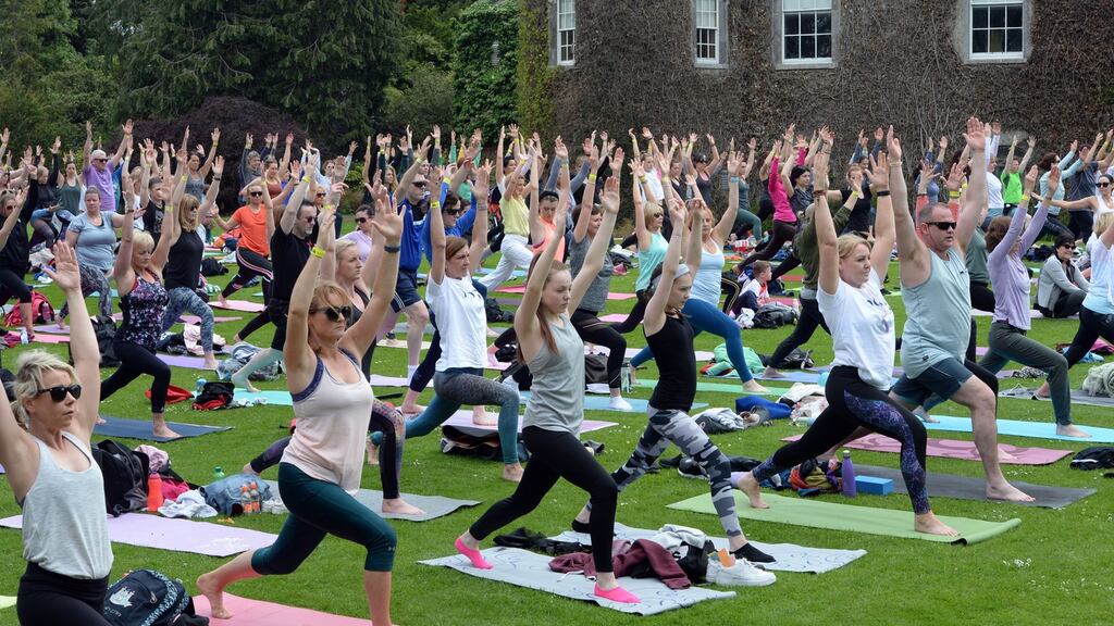 Yoga in a Dublin park. Photograph: Dara Mac Dónaill