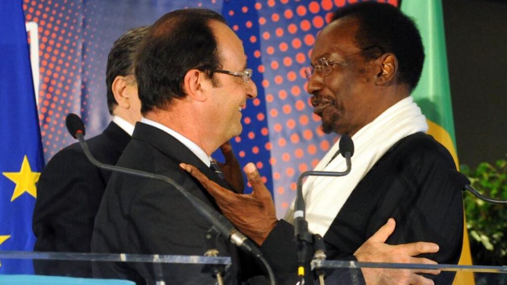 France’s President Francois Hollande (left) speaks with Mali’s interim President Dioncounda Traore at the Donor Conference in Brussels. Photograph: Reuters