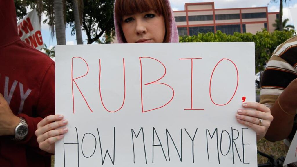 Caterina De Quesada and other supporters of Trayvon Martin protest in front of Florida senator Marco Rubio’s last April office to ask him to retract his support for Florida’s “stand your ground” gun law. Photograph: Joe Raedle/Getty Images