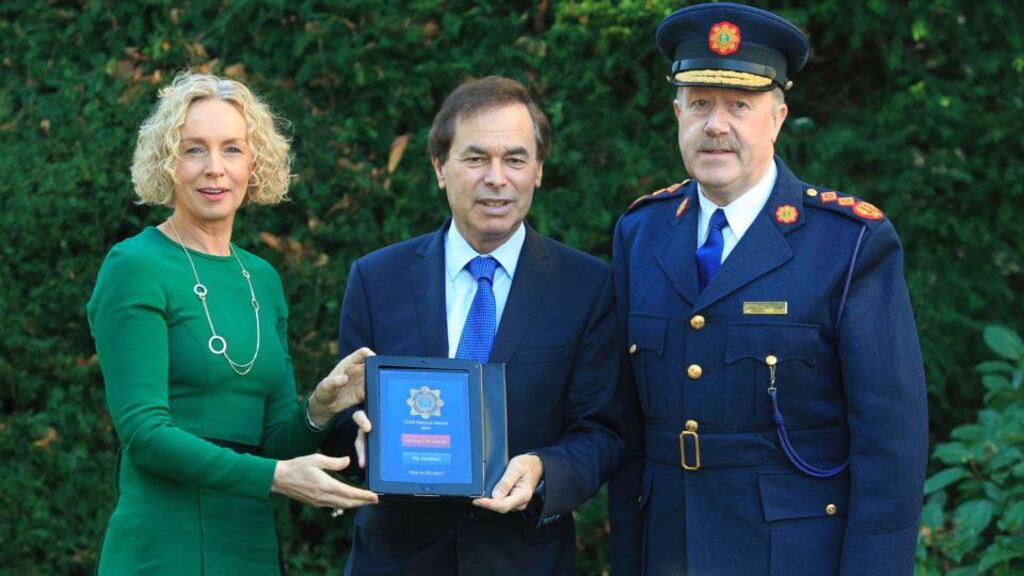 Anne O’ Leary, chief executive of Vodafone Ireland, Minister For Justice Alan Shatter and Garda Commisoner Martin Callinan launch a new Child Rescue Ireland (CRI) Alert smartphone app at Farmleigh house yesterdayn. Photograph: Gareth Chaney/Collins