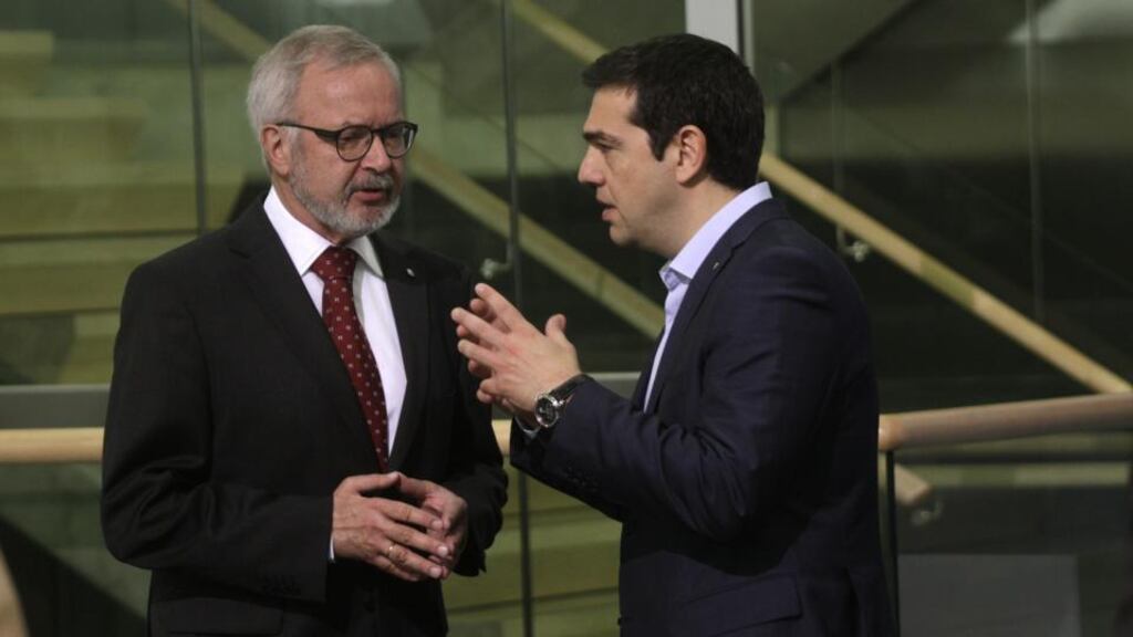 Greek prime minister of Greece Alexis Tsipras (right) and the president of the European Investment Bank Werner Hoyer at an Eastern Partnership summit in Riga, Latvia, on Friday. Photograph: EPA/Valda Kalnina