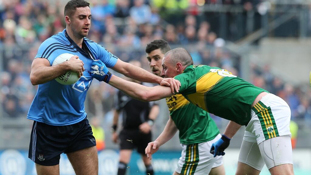 Dublin’s James McCarthy in action against Kieran Donaghy of Kerry. Photo: Lorraine O’Sullivan/Inpho