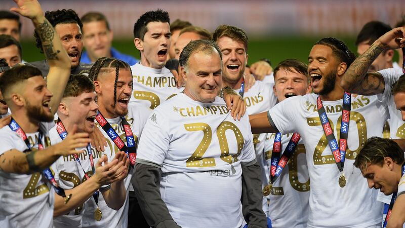 Leeds players and manager celebrate promotion last year. Photo: Michael Regan/Getty Images