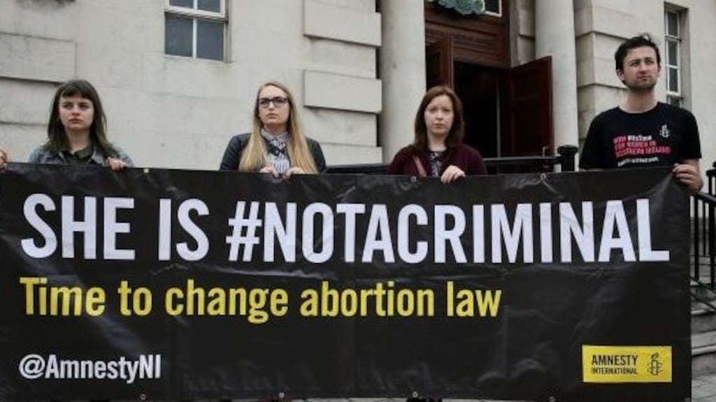 Campaigners demonstrate in support of the woman during a hearing in the case in September. Photograph: Brian Lawless/PA Wire