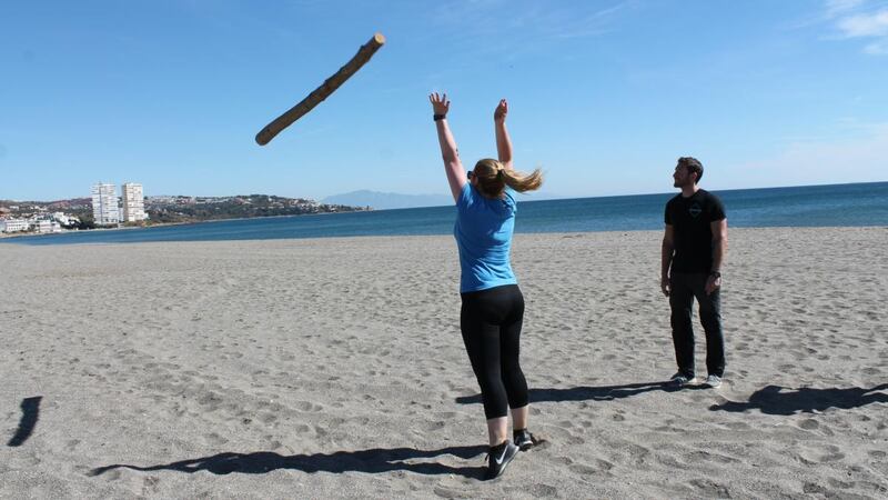 Rachel Flaherty throwing a pole on a beach in Sotogrande in Spain.