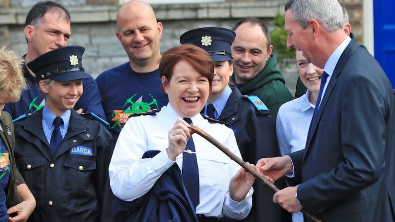 Garda Commissioner Nóirín O’Sullivan is presented with a shillelagh walking stick at Garda Headquarters by Chief Supt Pat Lordan. Photograph: Colin Keegan/Collins Dublin