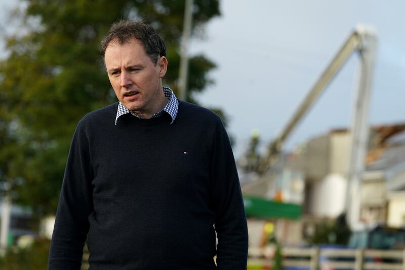 Minister for Agriculture Charlie McConalogue at the scene of the explosion in Creeslough in Co Donegal. Photograph: Brian Lawless/PA