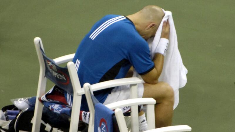 Agassi reacts after losing the 2005 US Open final 6-3, 2-6, 7-6 9(1), 6-1 to Roger Federer. Photo: Jason Nevader/Getty Images