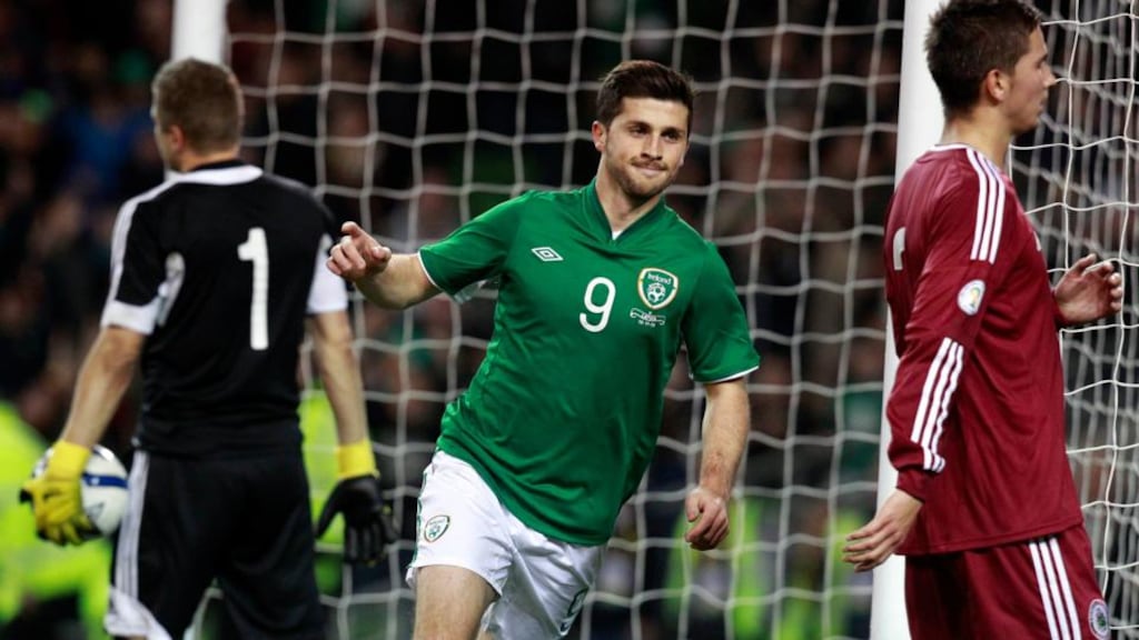Ireland’s Shane Long celebrates his late strike against Latvia.