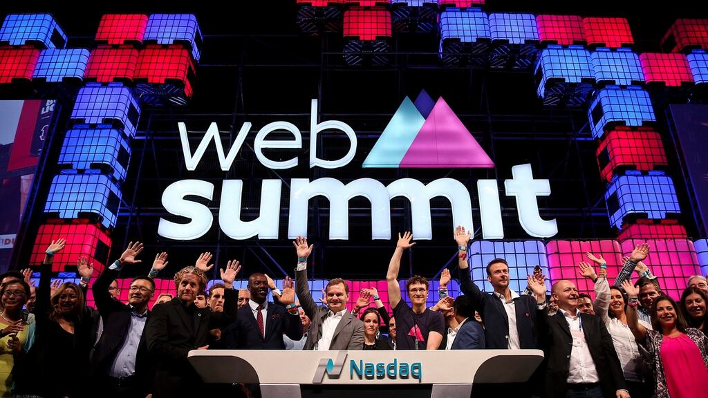 The founder and chief executive of Web Summit Paddy Cosgrave (centre, right) waves accompanied by other participants during the Nasdaq Bell opening ceremony at the third day of the Web Summit in Lisbon, Portugal, on Wednesday. Photograph: Andre Kosters/EPA
