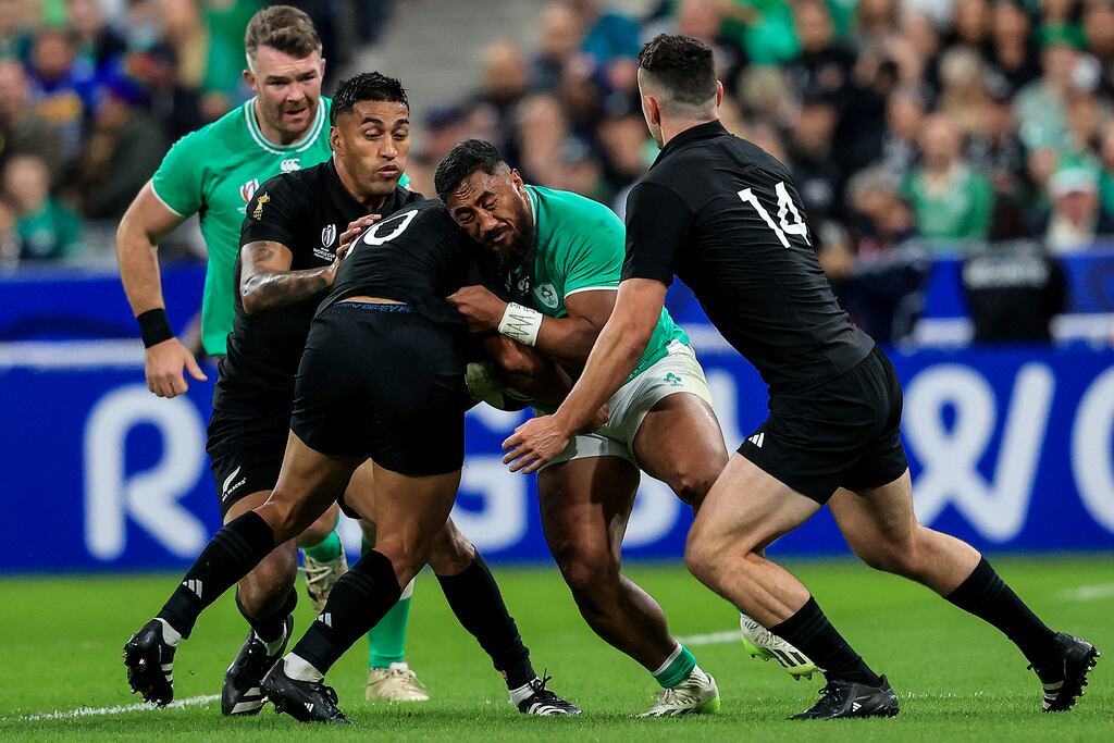 Ireland's Bundee Aki is tackled by New Zealand's Richie Mo'unga during the Rugby World Cup quarter-final at the Stade de France. Photograph: Dan Sheridan/Inpho