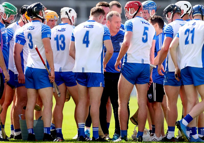 Liam Cahill with his Waterford squad during the Munster SHC quarter-final in 2021. Photograph: James Crombie/Inpho