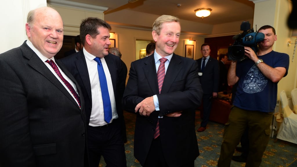 Minister for Finance Michael Noonan and Taoiseach Enda Kenny (with Dara Murphy TD) know that the real room for giveaways is severely limited. Photograph: Dara Mac Dónaill / The Irish Times