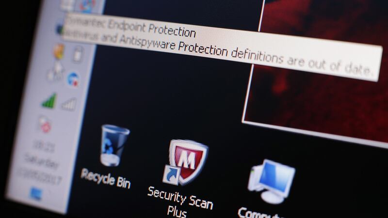 A message on a laptop screen from internet security software - warning users of outdated anti-virus and anti-spyware protection - after 150 countries were hit by a major cyber attack. Photograph: Yui Mok/PA Wire