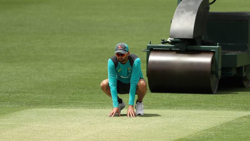 Nathan Lyon of Australia inspects the pitch on Wednesday. Photograph: Ryan Pierse/Getty Images