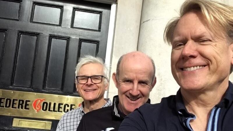 John Portmann (front) with Fr Paddy Greene SJ, rector of Belvedere College (middle) and John's partner Dan, at Belvedere College in Dublin, where John's grandfather taught for 30 years.