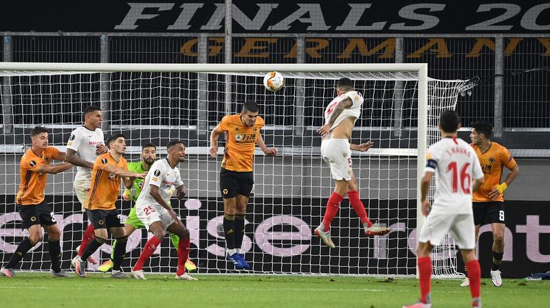 Lucas Ocampos heads home the winner. Photo: Ina Fassbender/AFP via Getty Images