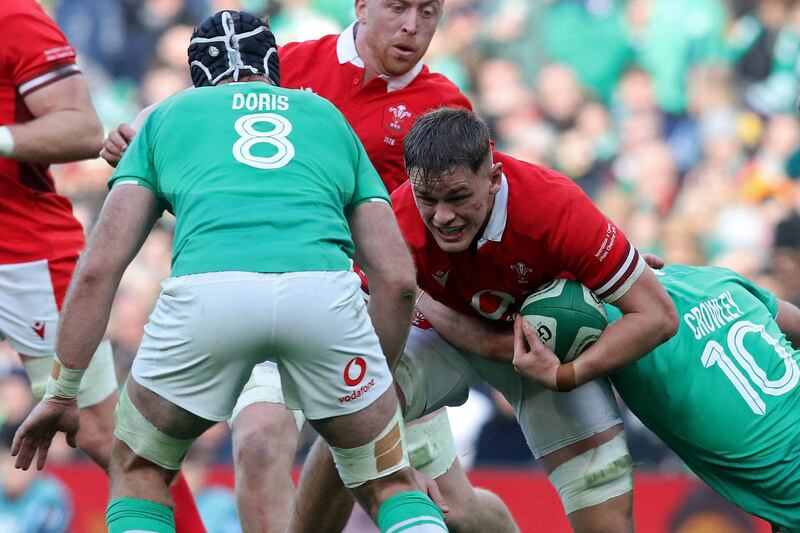 Wales' flanker Alex Mann is tackled by Ireland's Jack Crowley and Caelan Doris during the Six Nations match at the Aviva Stadium. Photograph: Paul Faith/AFP via Getty Images