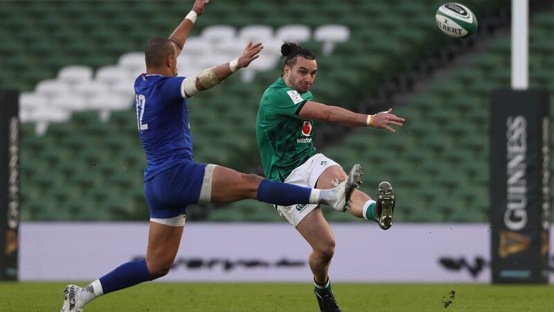 Ireland winger James Lowe clears the ball as France’s Gael Fickou attempts to block during the Six Nations game at the Aviva Stadium. Photograph: Brian Lawless/PA Wire