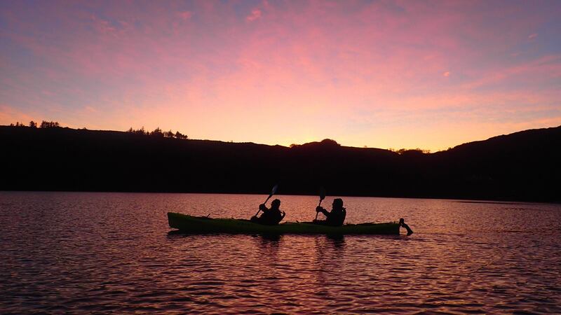On the night we visit, the water is like glass; stop paddling, and you drift along silently