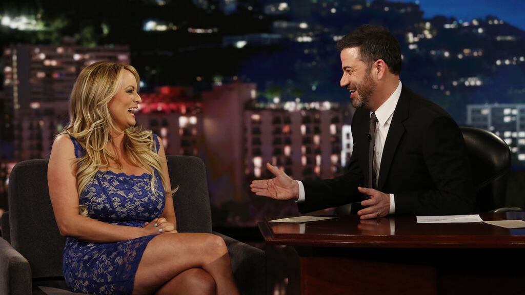 This image released by ABC shows adult film star Stormy Daniels laughing  with host Jimmy Kimmel during an appearance on Jimmy Kimmel Live!  in Los Angeles. Photograph: Randy Holmes/ABC via AP