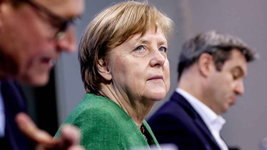Berlin mayor Michael Mueller, Chancellor Angela Merkel and premier of Bavaria Markus Soeder after a video conference with German state premiers about the  coronavirus situation. Germany’s contagion rate has nearly doubled in the past month. Photograph: Filip Singer/EPA