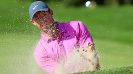 McIlroy and Woods toil but finish within striking distance in Ohio