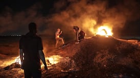 Israeli intelligence officials warn of security risks as hundreds of reservists refuse to serve in protest