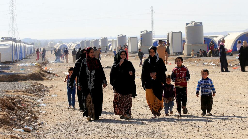 People displaced by the fighting around Mosul at Al-Khazer refugee camp, east of the Iraqi city, on Friday. Photograph: Thaier Al-Sudaini/Reuters