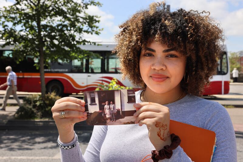 Sarah Lennon holds a photograph of her Irish grandparents. Photograph: Dara Mac Dónaill/The Irish Times